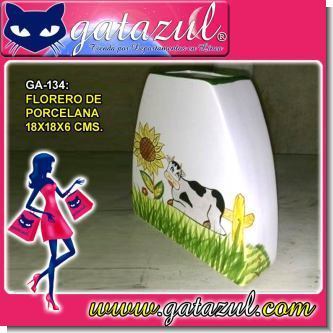 Lee el articulo completo FLORERO DE PORCELANA CON DISENO DE VACAS (18X18X6 CENTIMETROS)